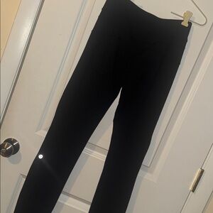 Women’s solid black Lululemon athletic casual leggings pocket size 4